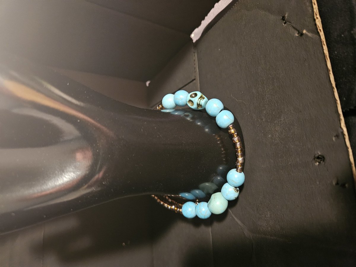 Teal skull bead bracelet 
